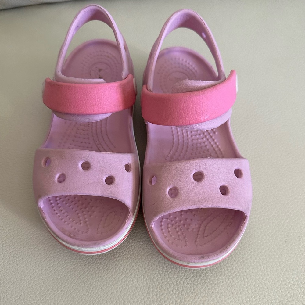 Crocs sandals in size 10 for girls.